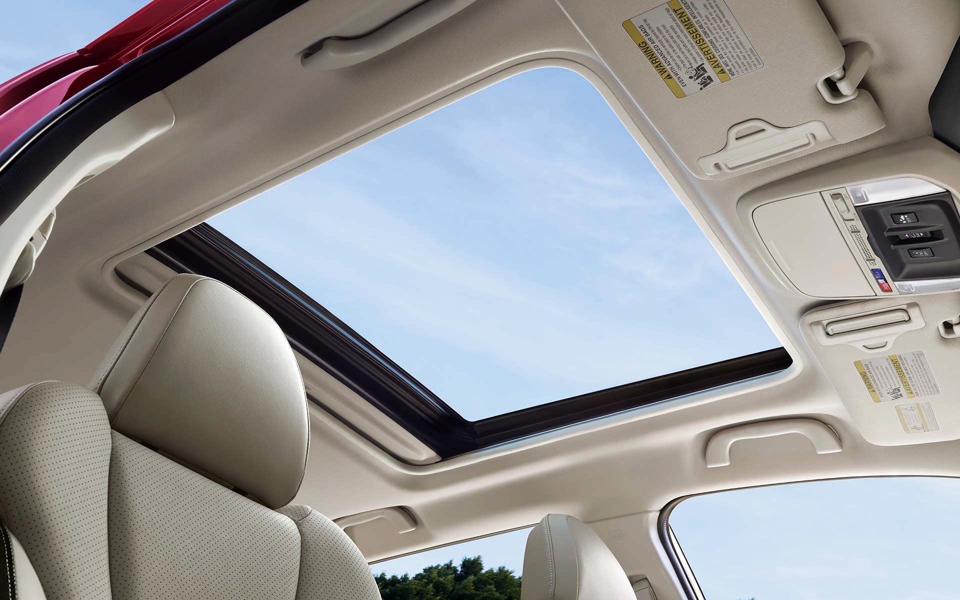 A view through the power sliding panoramic moonroof on the 2022 Forester Sport. | Subaru Superstore of Chandler in Chandler AZ